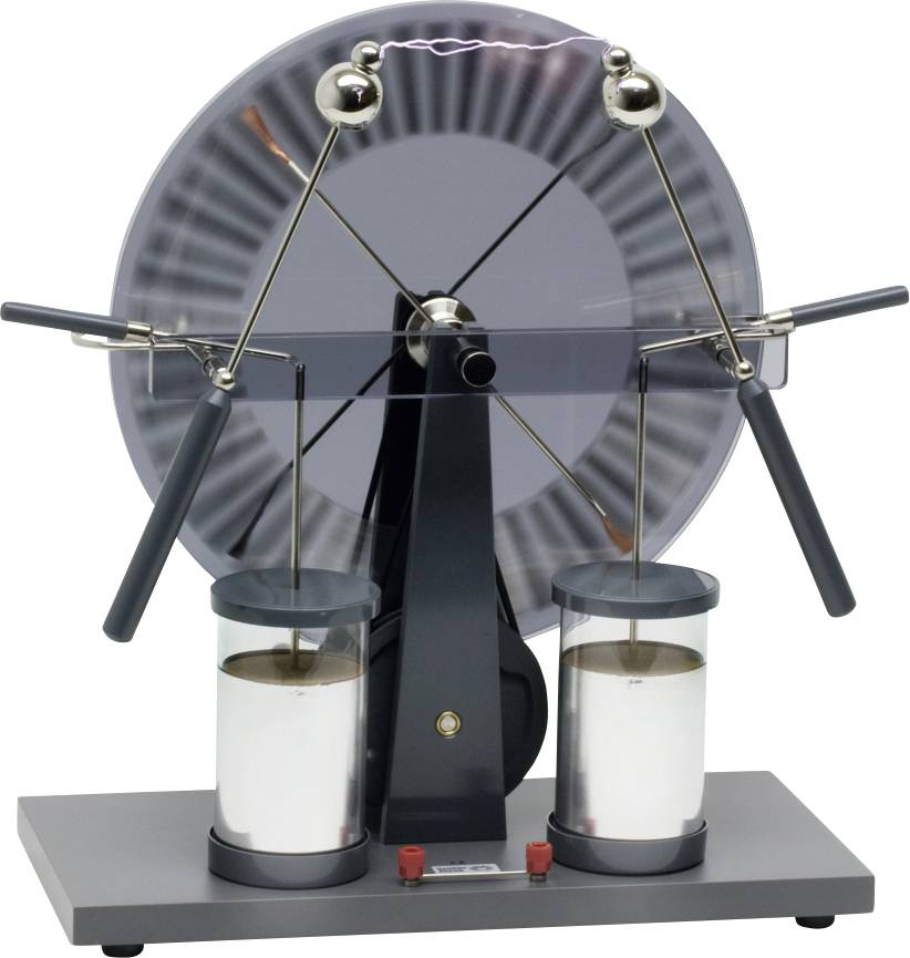 Machine de Wimshurst générant de l'électricité statique avec une étincelle visible entre des sphères métalliques, utilisée pour l'enseignement de la physique.