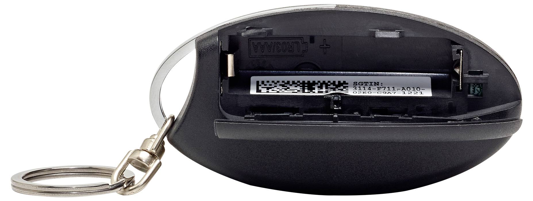 «Un télécommande de voiture avec son couvercle arrière retiré, exposant le compartiment de la batterie et un anneau porte-clés circulaire attaché sur le côté.»