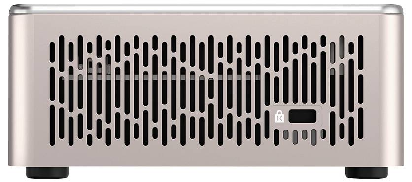 Un appareil métallique, compact, doté d'un devant perforé pour la ventilation et un petit bouton rectangulaire noir dans le coin inférieur droit.