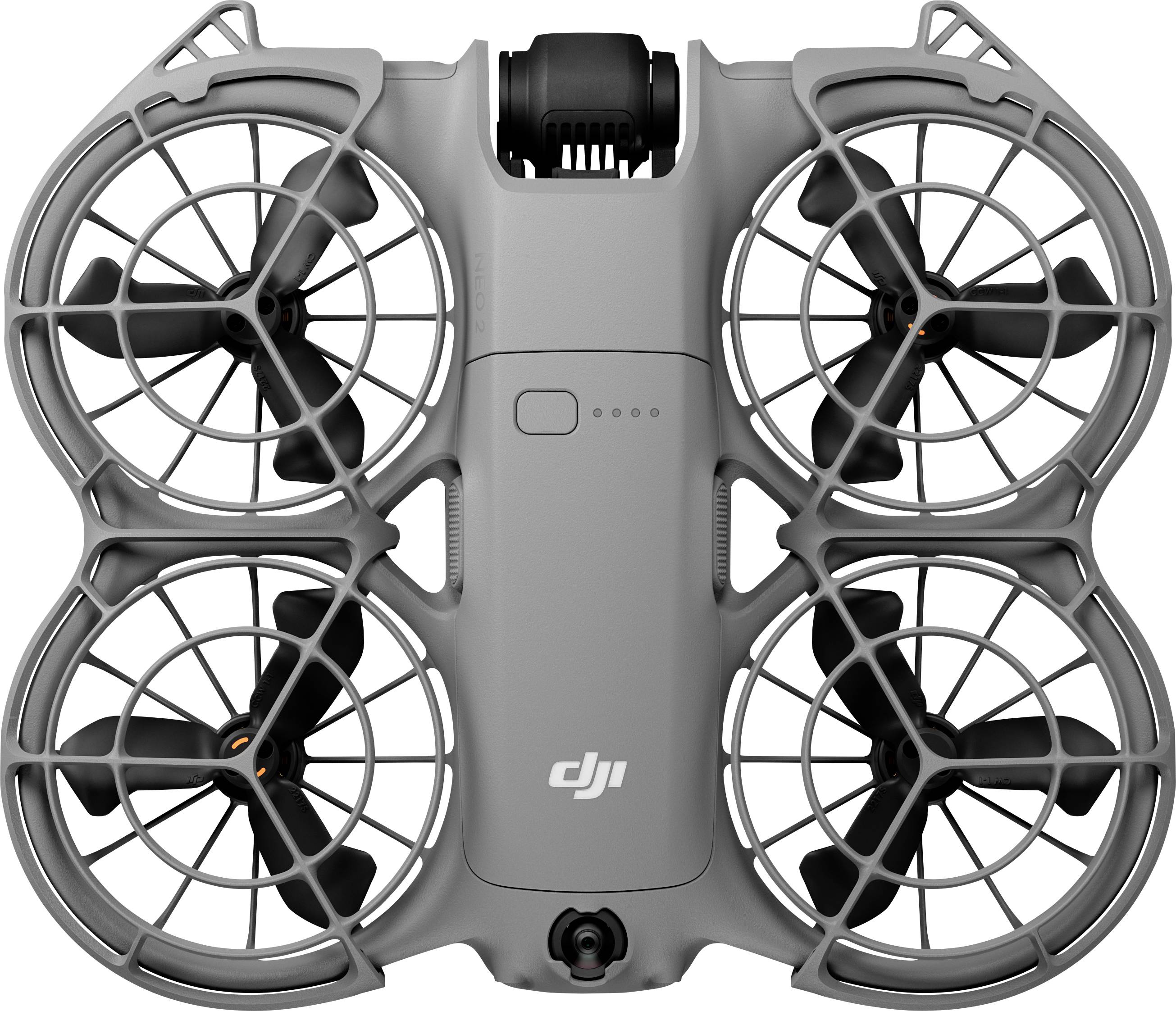 Un drone quadricoptère compact gris, avec quatre protections circulaires d'hélices, équipé d'une caméra à l'avant et du logo « DJI » sur le corps.