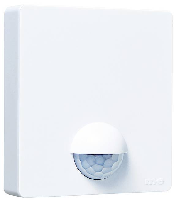 Un dispositif blanc de détecteur de mouvement avec un dôme demi-sphérique, monté sur une surface plane.