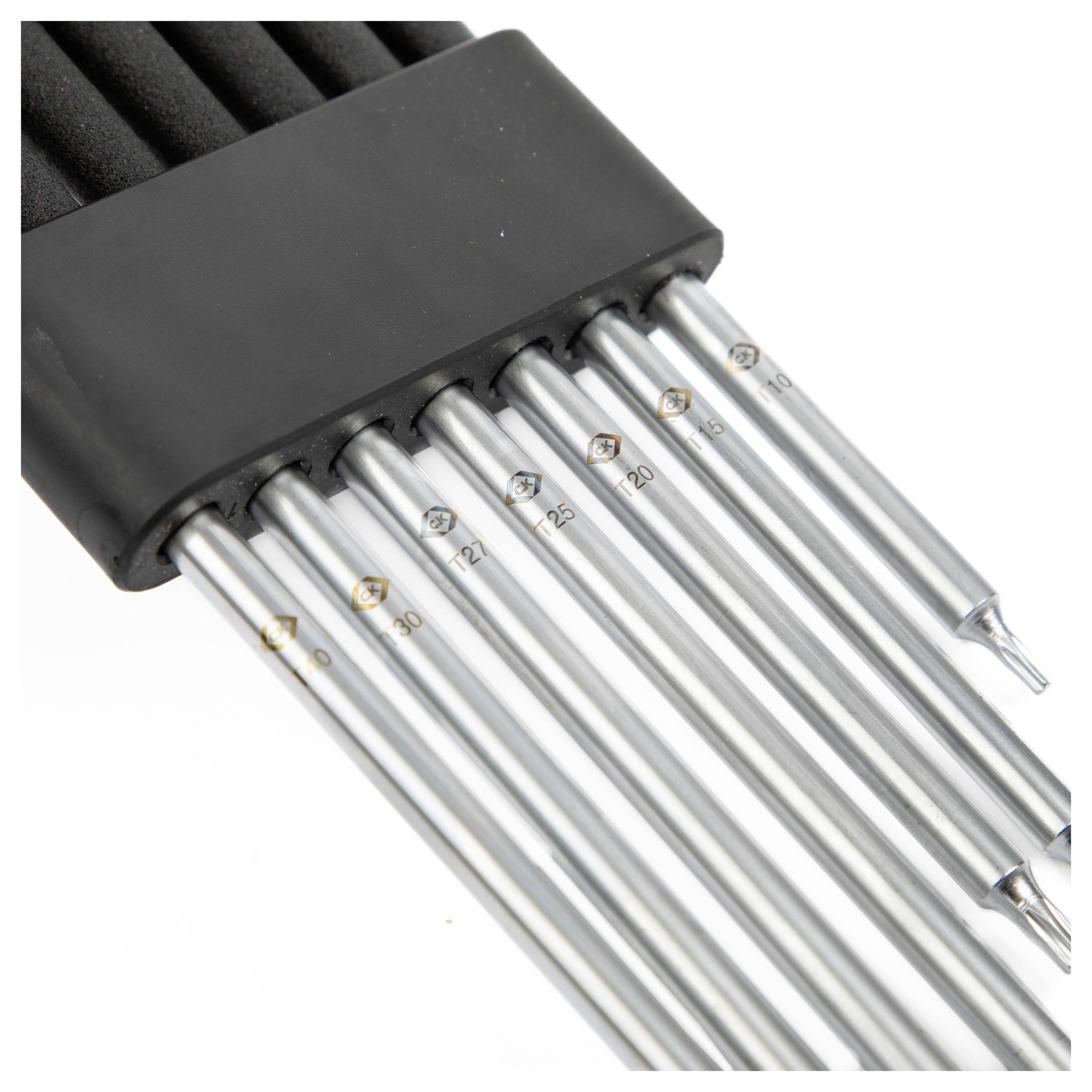 Un ensemble de six tournevis de précision de tailles variées placés dans un support noir.