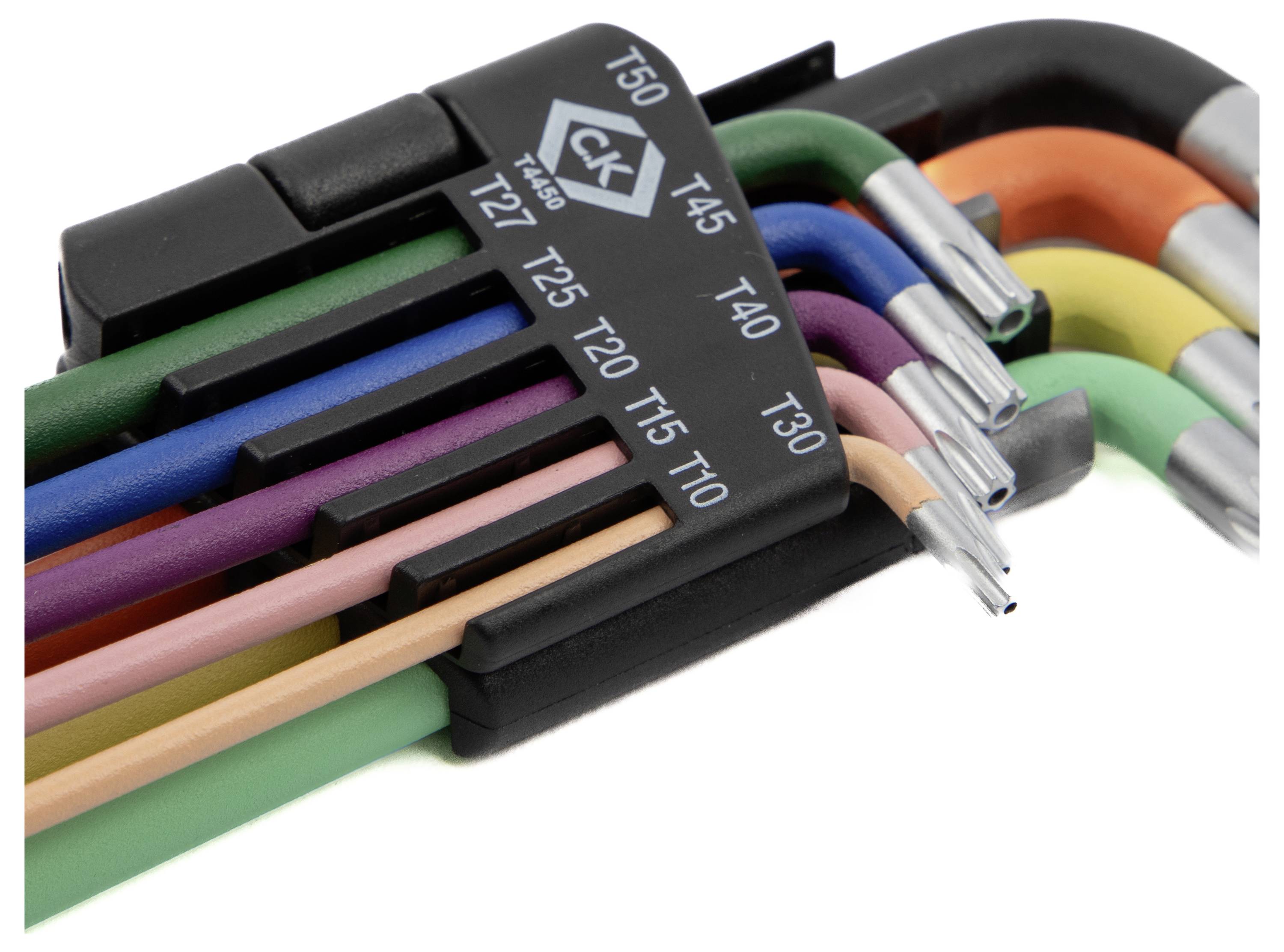 Un ensemble de clés hexagonales code couleur étiquetées avec des tailles allant de T10 à T50, rangées dans un support en plastique ; utilisées pour tourner les vis à empreinte hexagonale.