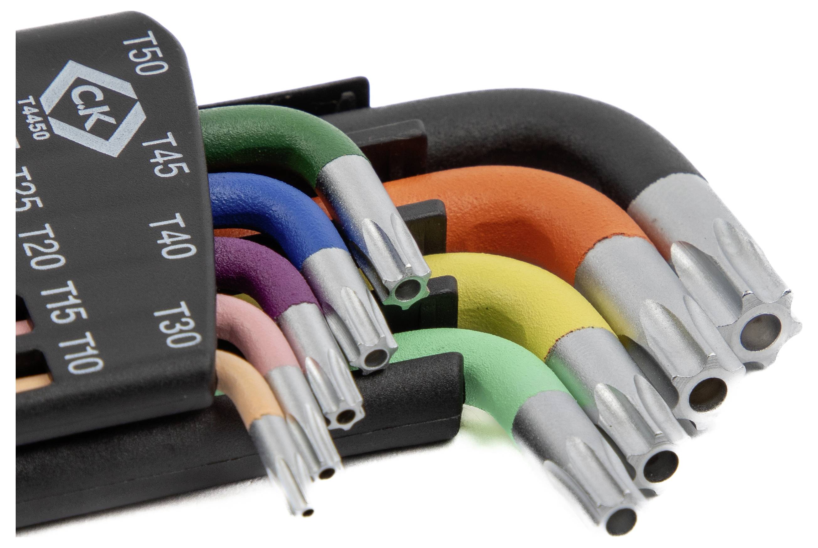 Un ensemble de clés Torx en forme de L colorées en différentes tailles, étiqueté de T10 à T50, disposé dans un support pour une organisation facile.
