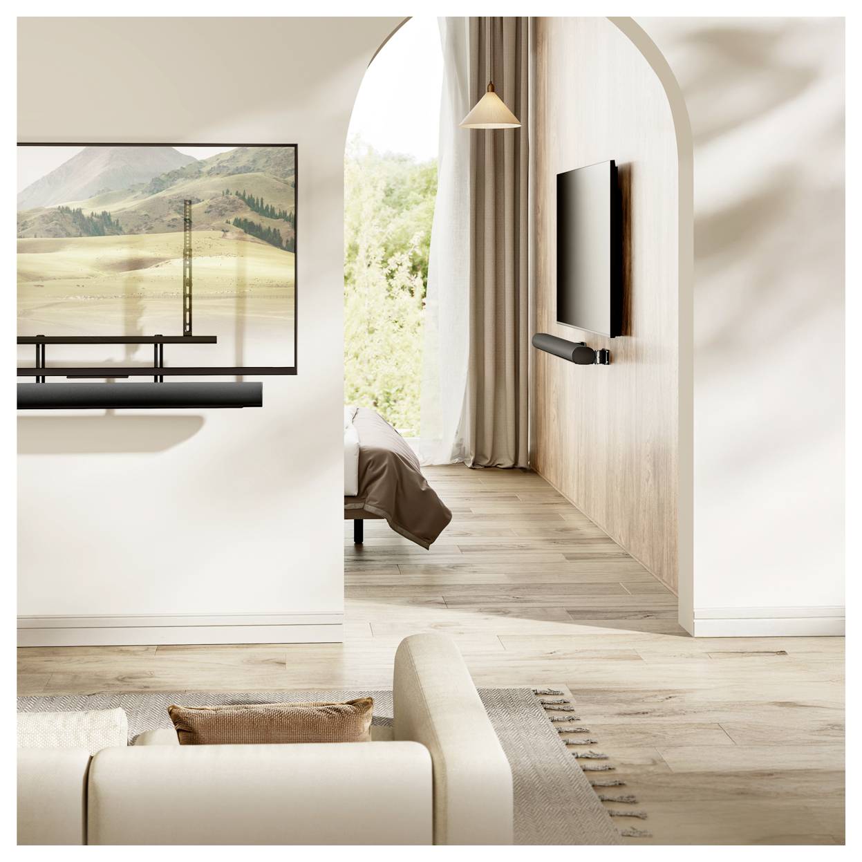 Ein modernes Wohnzimmer verfügt über ein beigefarbenes Sofa, einen an der Wand montierten Fernseher in der Nähe eines gemütlichen Betts und ein großes Landschaftsgemälde, wobei natürliches Licht hereinströmt.