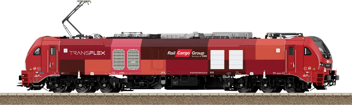 Une locomotive de train rouge du groupe Transflex Rail Cargo est présentée sur les rails, dotée d'une conception moderne et de lignes angulaires sous un ciel dégagé.