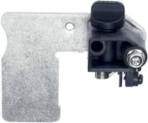 Eine Metallklammer mit einer schwarzen Kunststoffkomponente, möglicherweise Teil eines mechanischen oder elektronischen Geräts, auf einer ebenen Fläche montiert.