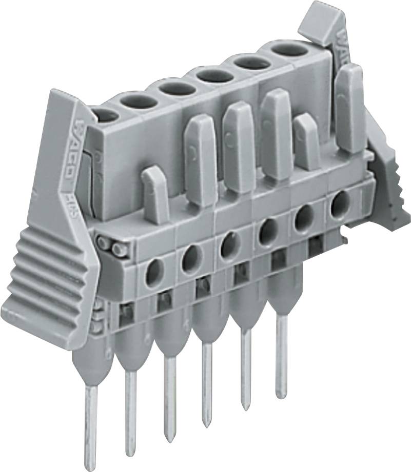 Un connecteur gris multi-broches avec six broches qui dépassent, utilisé pour le câblage électrique.