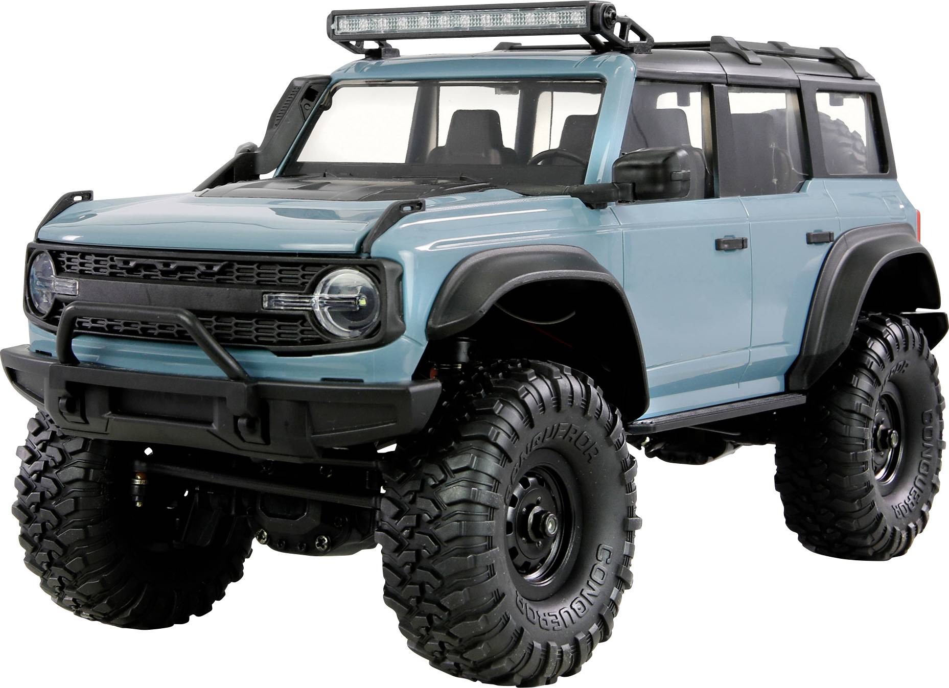 A toy model of an off-road vehicle with large tires and a light bar on top, showcasing a robust design in blue and black colors.
