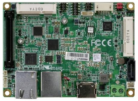 A small green circuit board with various electronic components, ports, and printed labels visible.