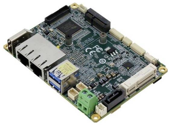 A small, rectangular computer motherboard with various ports, including Ethernet and USB connections, surrounded by multiple components.