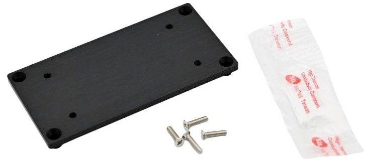 Black rectangular mounting bracket with four screw holes, accompanied by four metal screws and a small wrapped adhesive strip.