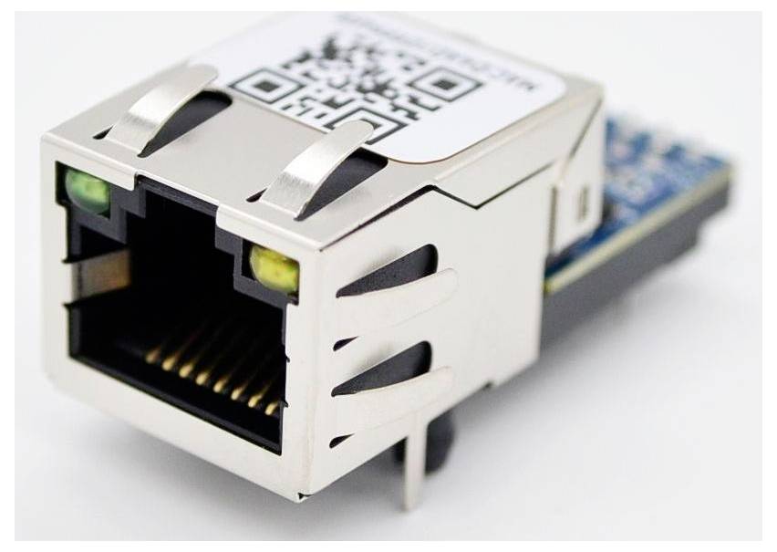 RJ45 Ethernet connector with attached circuit board, featuring a QR code on top. Used for networking and data transmission.