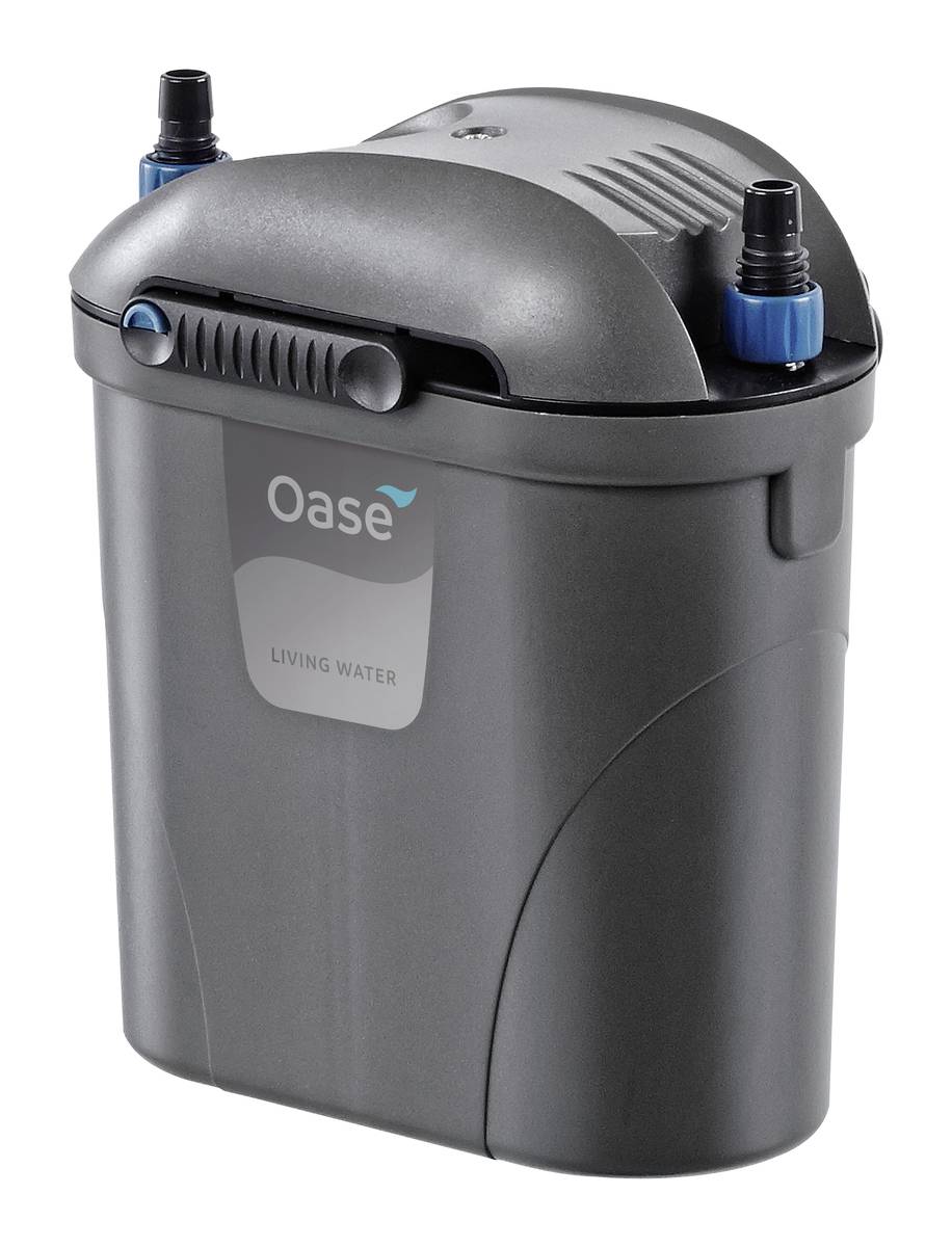 Black Oase Living Water outdoor filter or pump unit with gray top, blue hose connectors, shown on a white background.