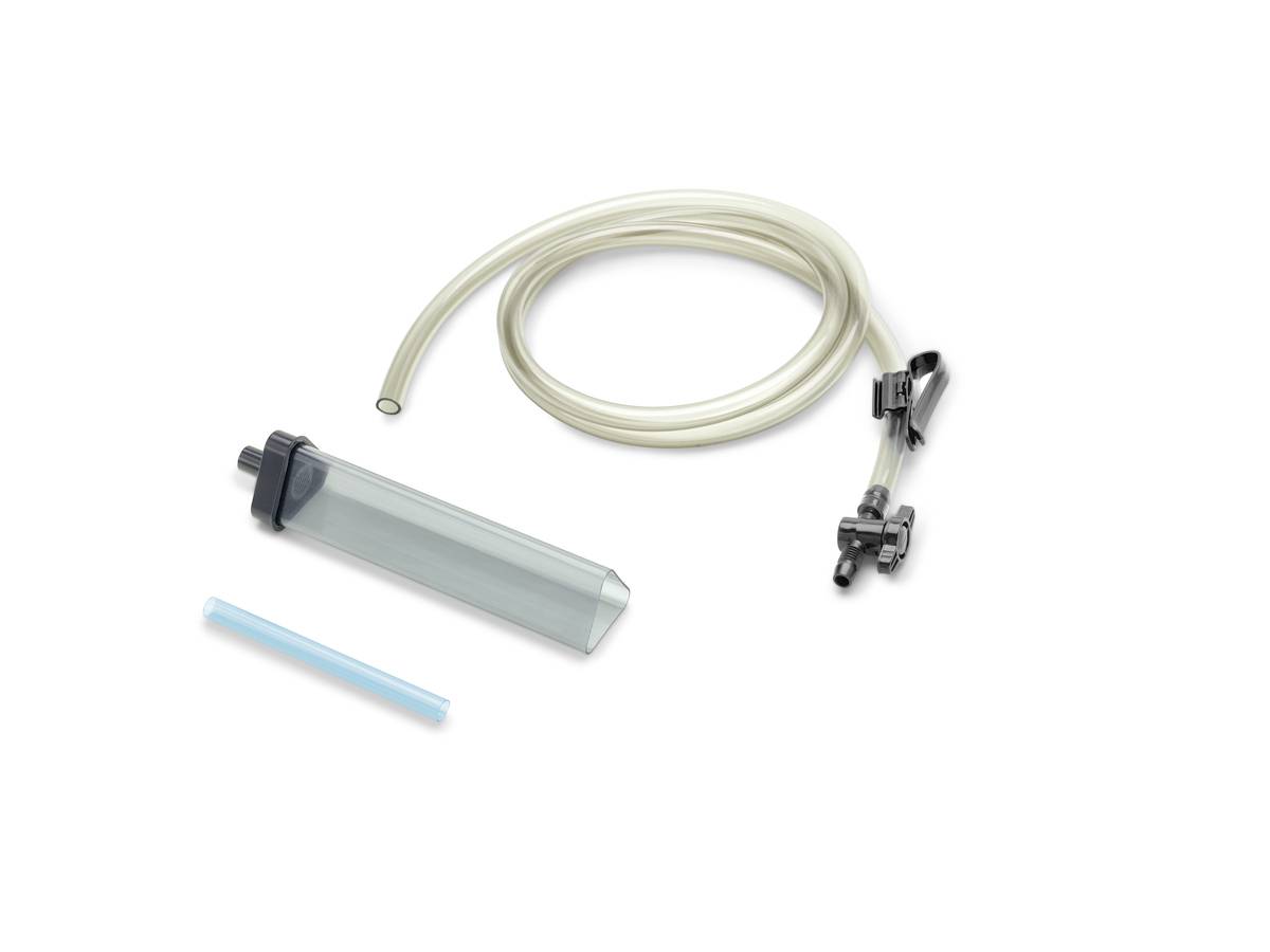 Medical tubing kit with a clear reservoir chamber, coiled hose, black clamp valve, and a small blue tube on a white background.