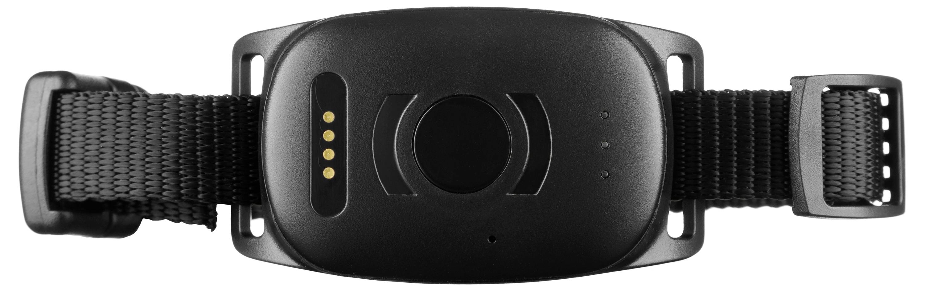 « Un appareil portable noir présenté de l'arrière, avec un bracelet et des contacts de charge, ressemblant à un tracker de fitness ou à une montre intelligente. »