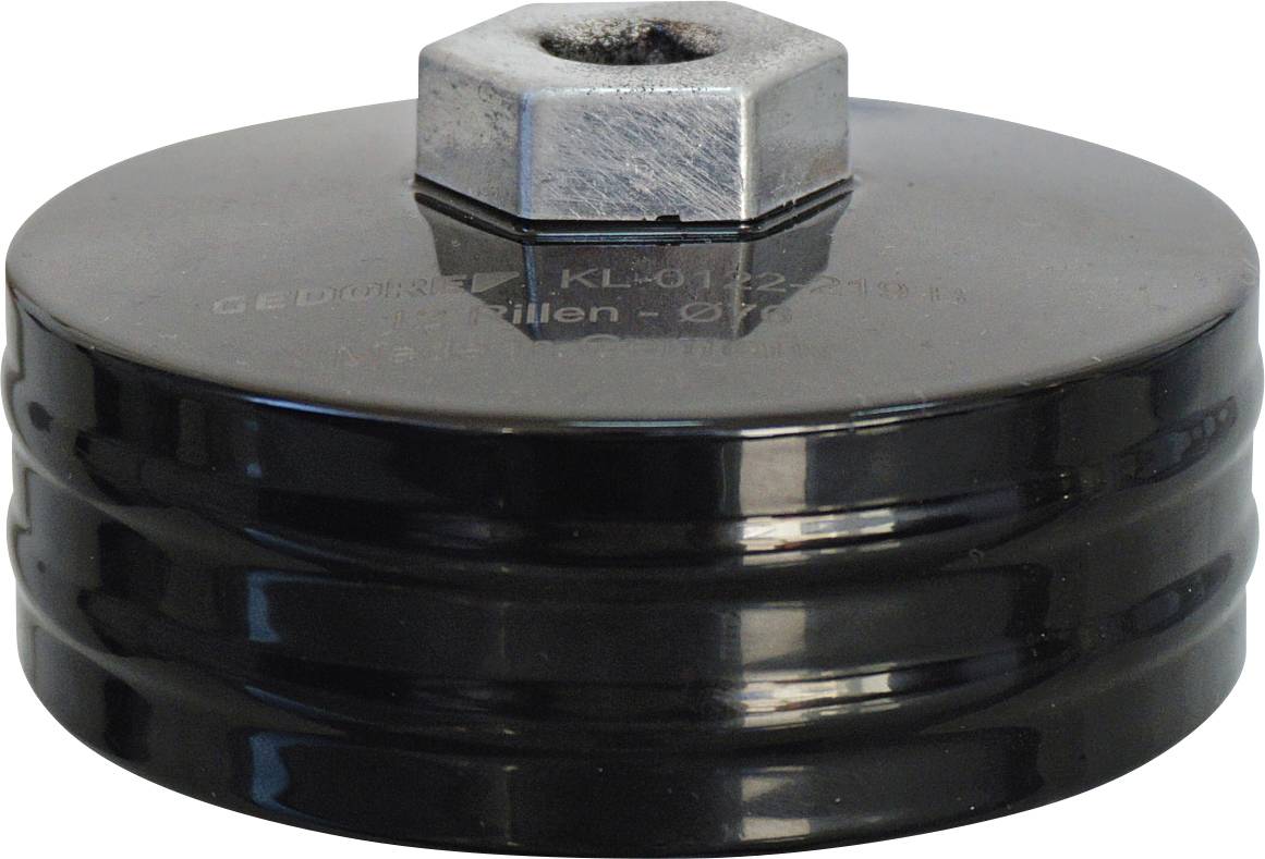 Une pièce d'outil en métal noir de forme ronde avec un boulon sur le dessus. De conception ronde et multicouche, elle semble être un composant pour les assemblages mécaniques.