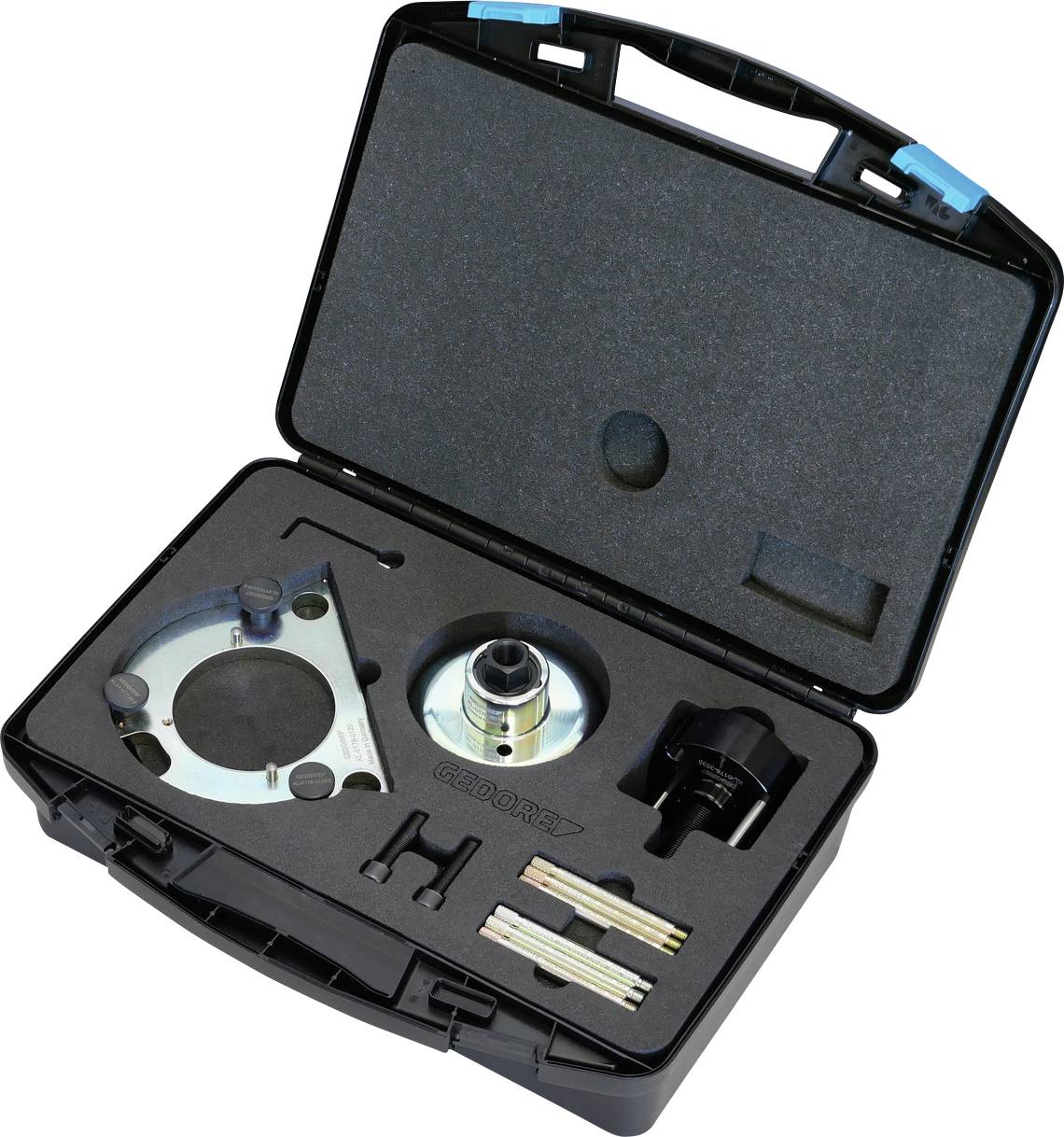 Une mallette d'outils dans un étui de transport noir, contenant divers outils et composants soigneusement rangés dans un rembourrage en mousse.