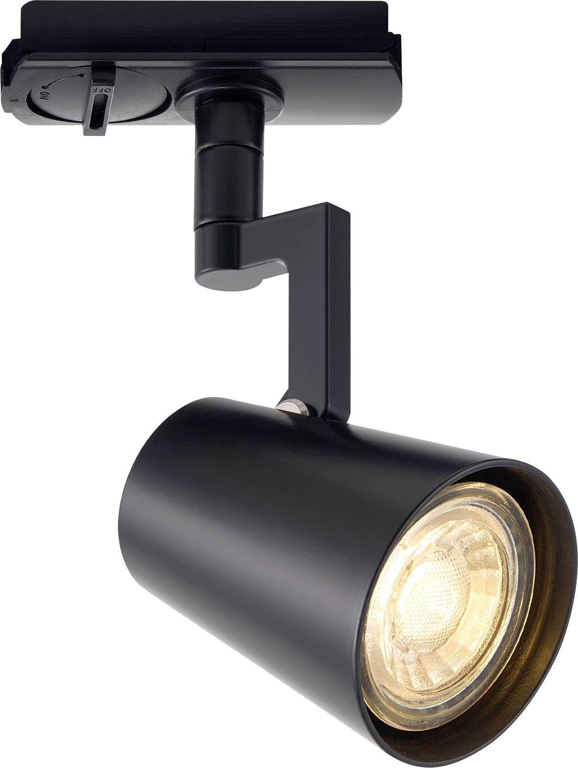 Un luminaire sur rail noir avec un projecteur réglable, illuminé d'une lueur chaude, probablement utilisé pour mettre en évidence des zones spécifiques.