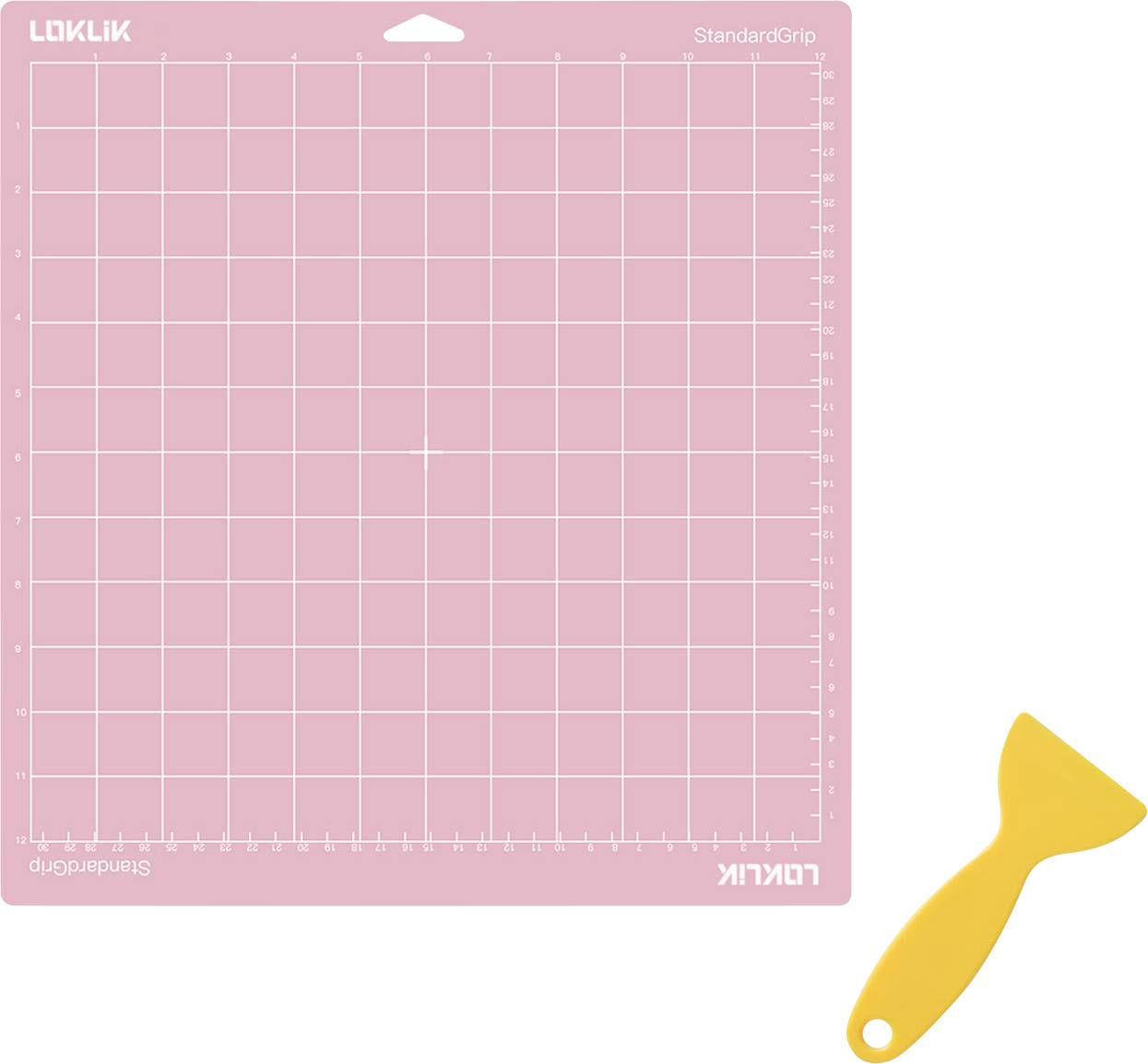 Un tapis de bricolage rose avec un motif de grille, étiqueté « StandardGrip », à côté d'un outil de raclage jaune.