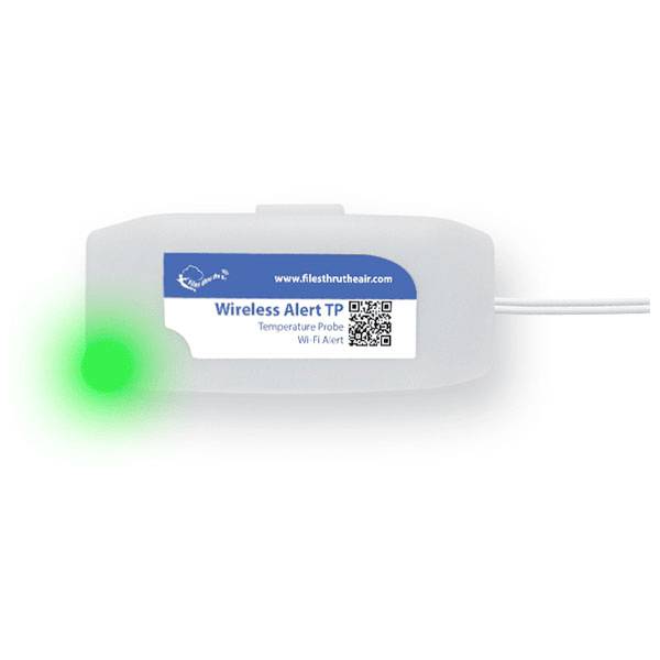 Un appareil blanc étiqueté « Wireless Alert TP » avec un voyant LED vert indiquant l'état opérationnel. Des fils de connexion s'étendent du côté droit.