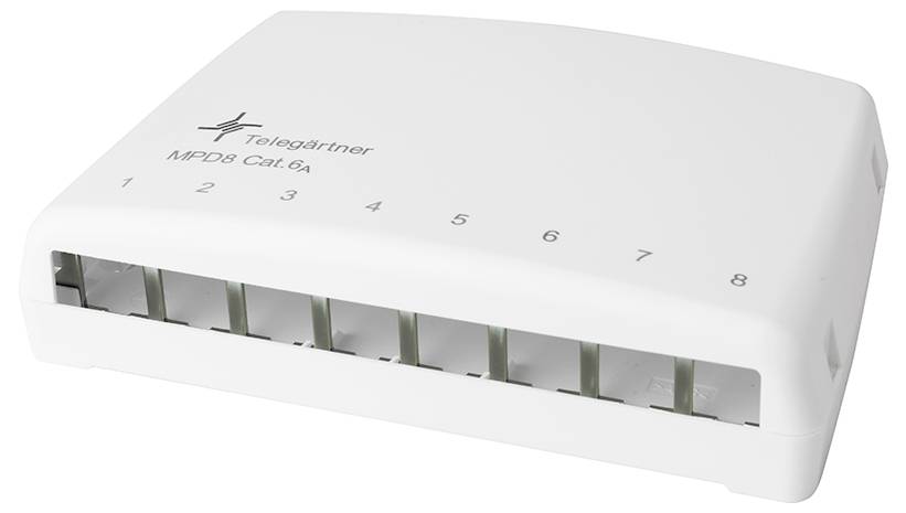Commutateur réseau Ethernet blanc à huit ports portant les étiquettes « Telegarther » et « MPDS Cat6a », avec des ports numérotés de 1 à 8.