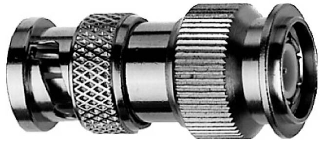 Close-up of a metal coaxial cable connector with knurled grip rings and a threaded coupling end on a white background.