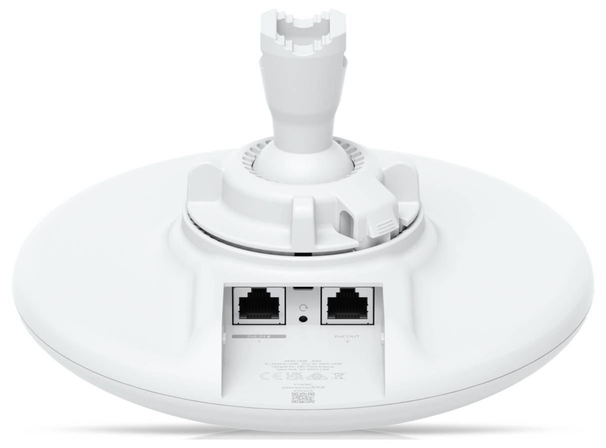 Un appareil électronique blanc et circulaire avec deux ports Ethernet et un support de montage sur le dessus, probablement une antenne réseau ou un point d'accès.