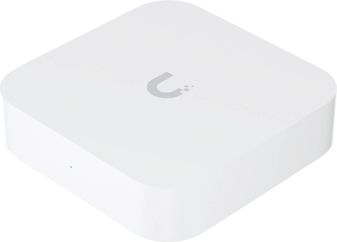 Un petit appareil électronique blanc de forme carrée avec des bords arrondis et un logo sur le dessus.