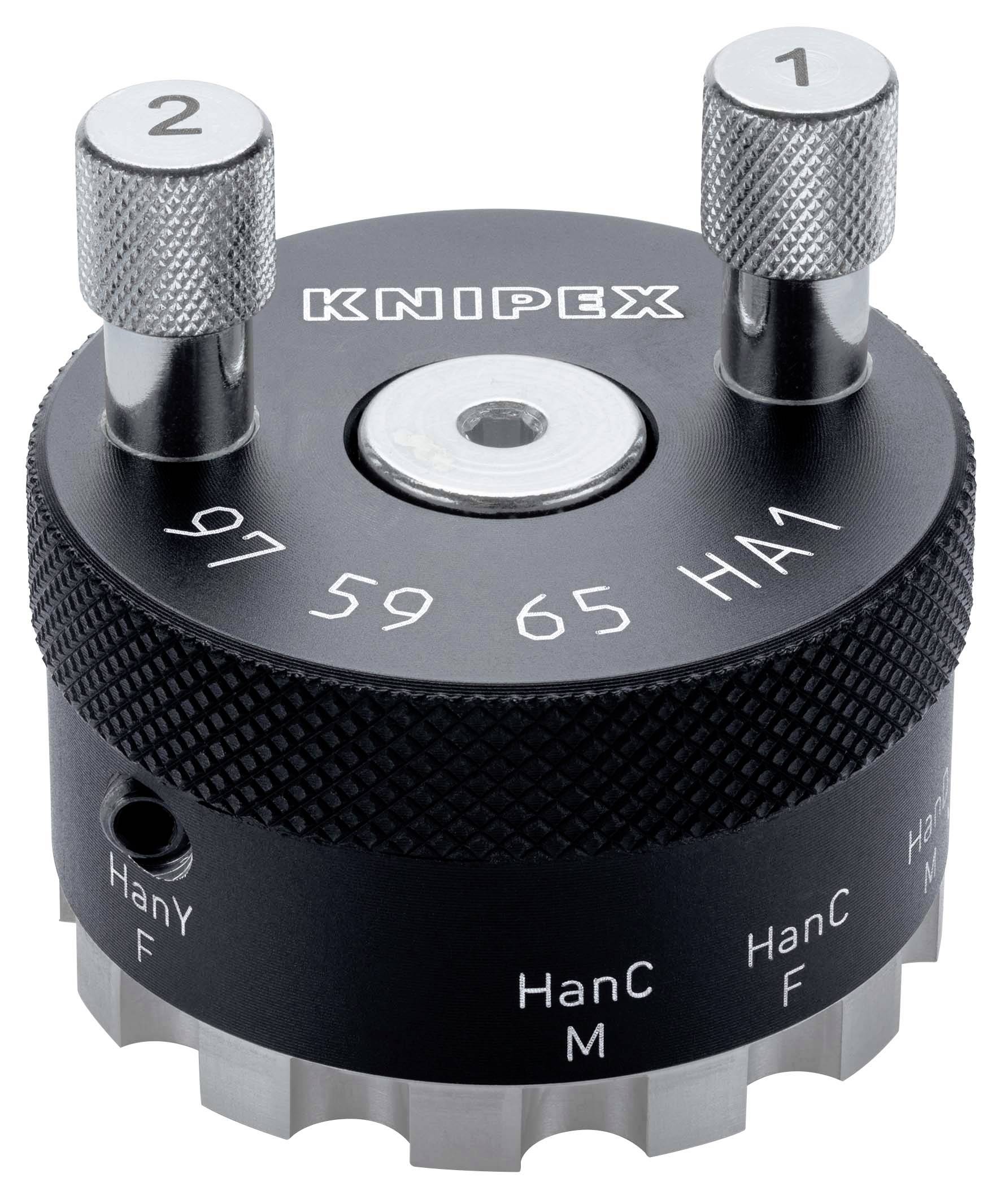 KNIPEX adjustment tool with two numbered metal posts on a black circular dial marked 57, 59, 65 and HA1, used for setting ring positions.