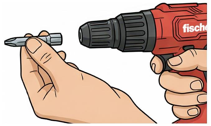 Les mains tiennent un foret près d'une perceuse électrique rouge, montrant comment insérer le foret dans le mandrin.