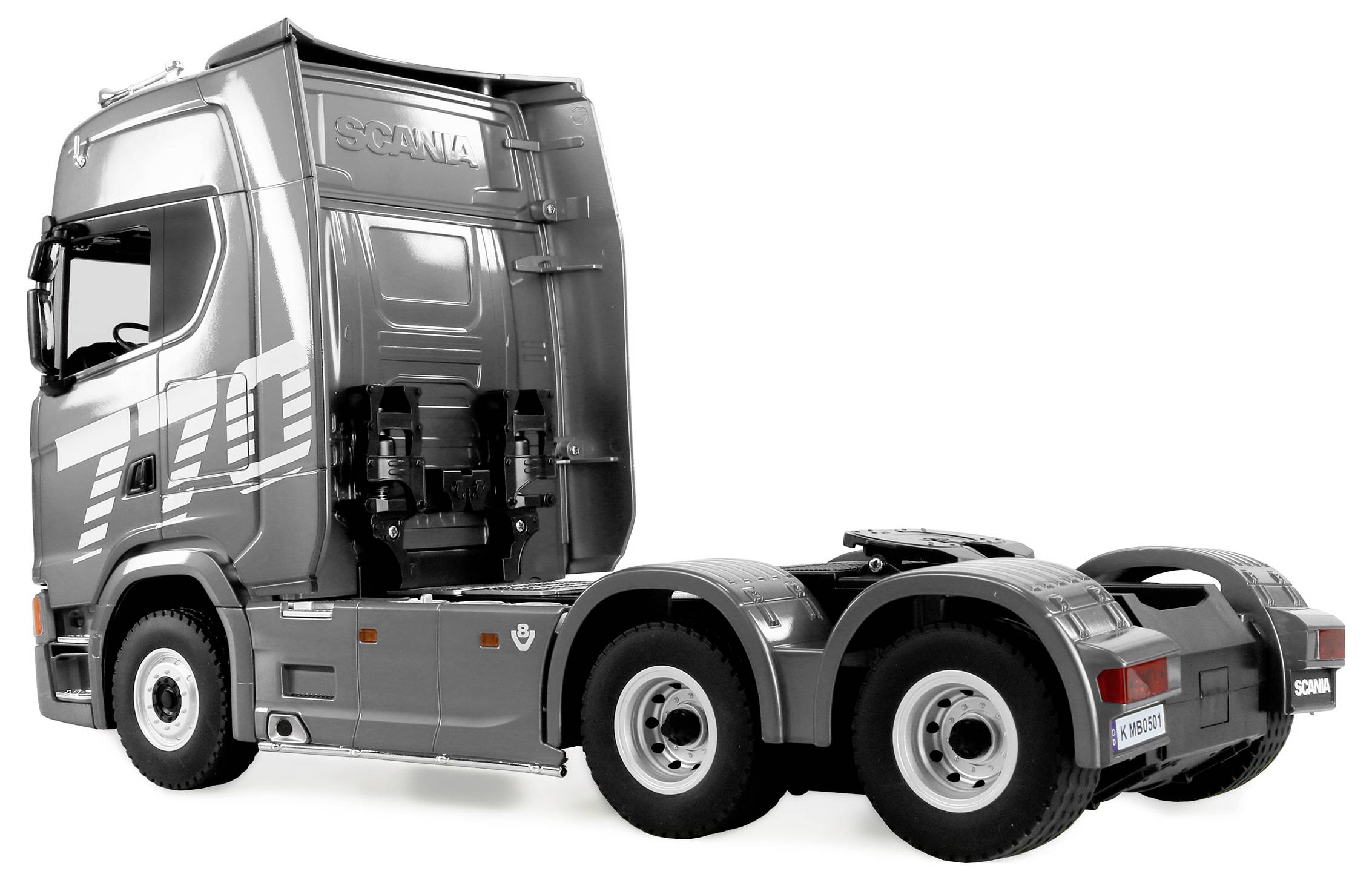 Cabine de tracteur routier Scania grise sans remorque, présentée en vue de profil sur fond blanc.