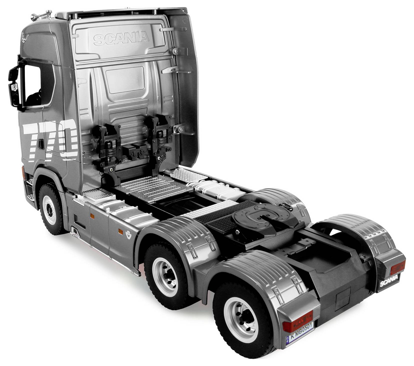 Cabine de tracteur routier Scania gris présentée sous une vue trois-quarts arrière sur fond blanc.