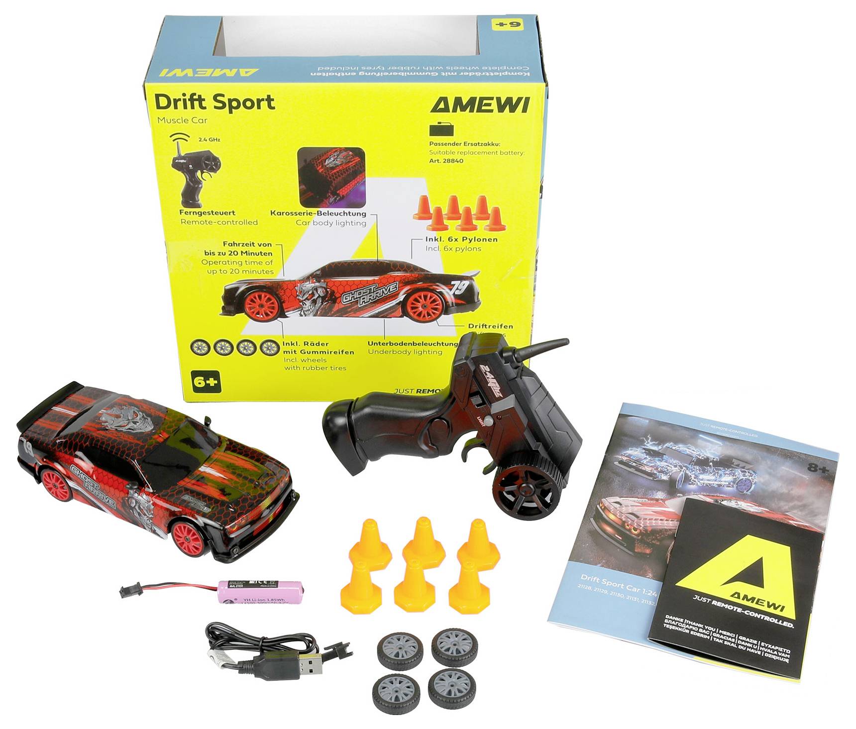Kit de voiture radiocommandée AMEWI Drift Sport en boîte avec émetteur, batterie, chargeur, roues de rechange, cônes et manuel d'instructions affichés à côté.