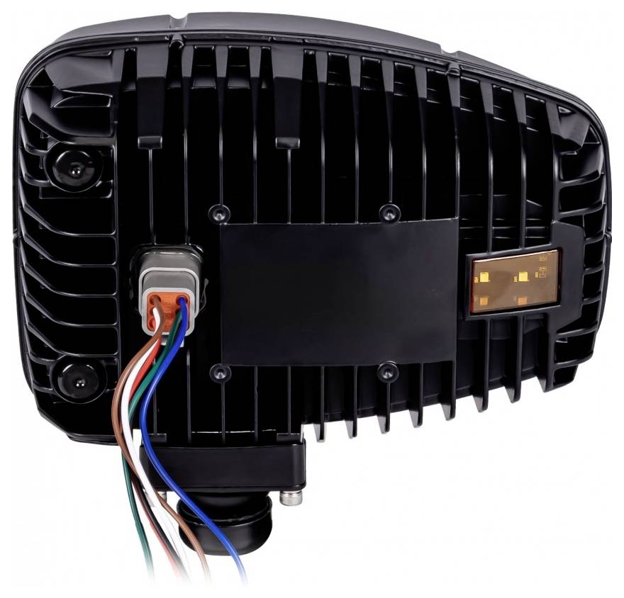 Rear view of a black rectangular electronic device with cooling fins, a wired connector, and a small orange status display on the right.