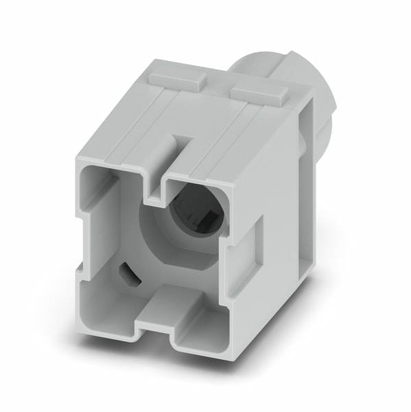 Close-up of a white plastic electrical connector housing, shown alone on a plain background.