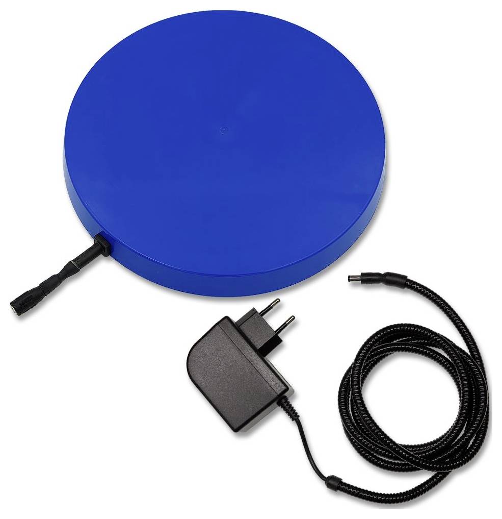 Coussin chauffant électrique bleu rond avec adaptateur d'alimentation et cordon enroulé sur fond blanc.