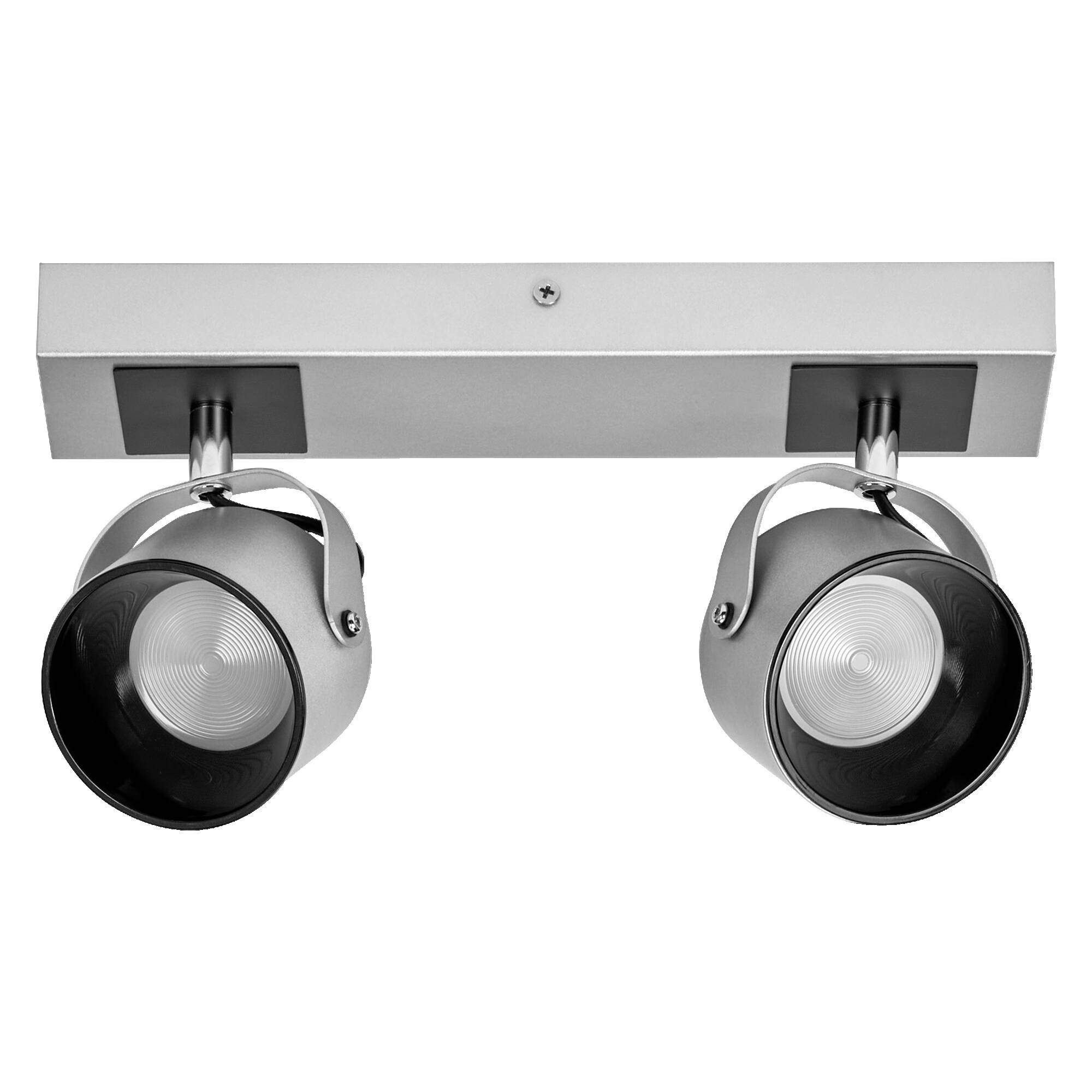 Deux luminaires de projecteur noirs ajustables montés sur une barre de plafond rectangulaire argentée.