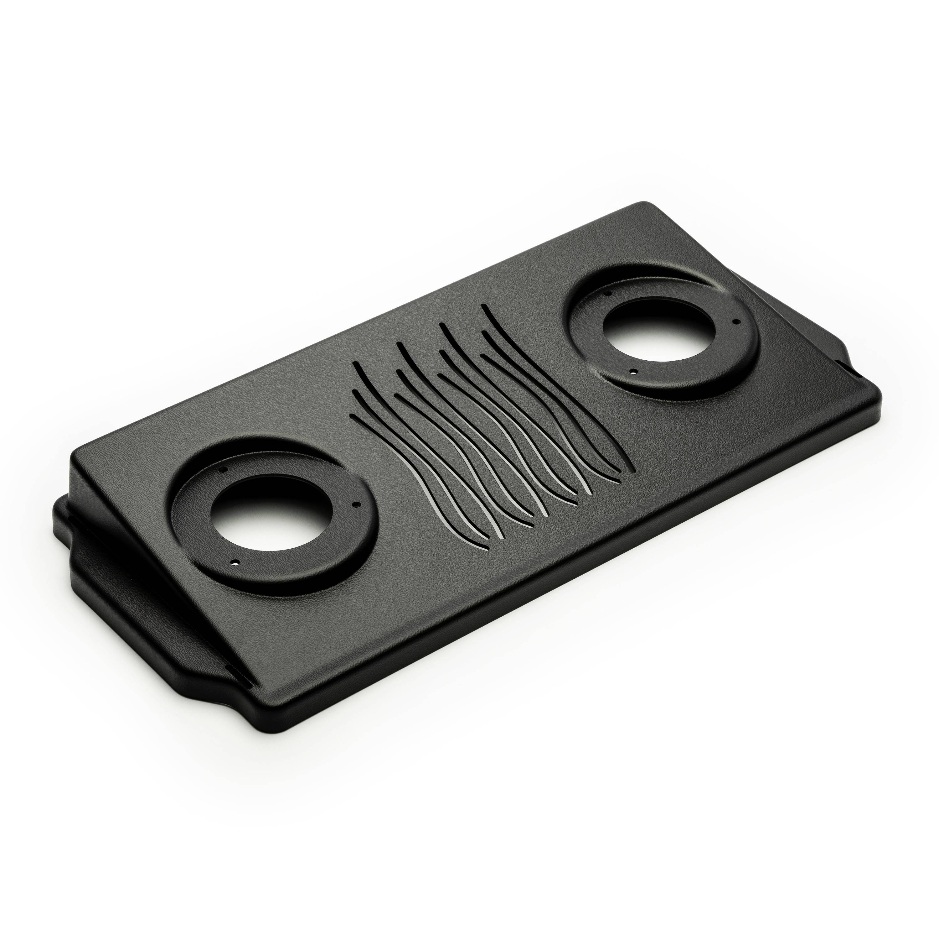 Black rectangular plastic device with two circular openings and a wavy center pattern, shown on a white background.