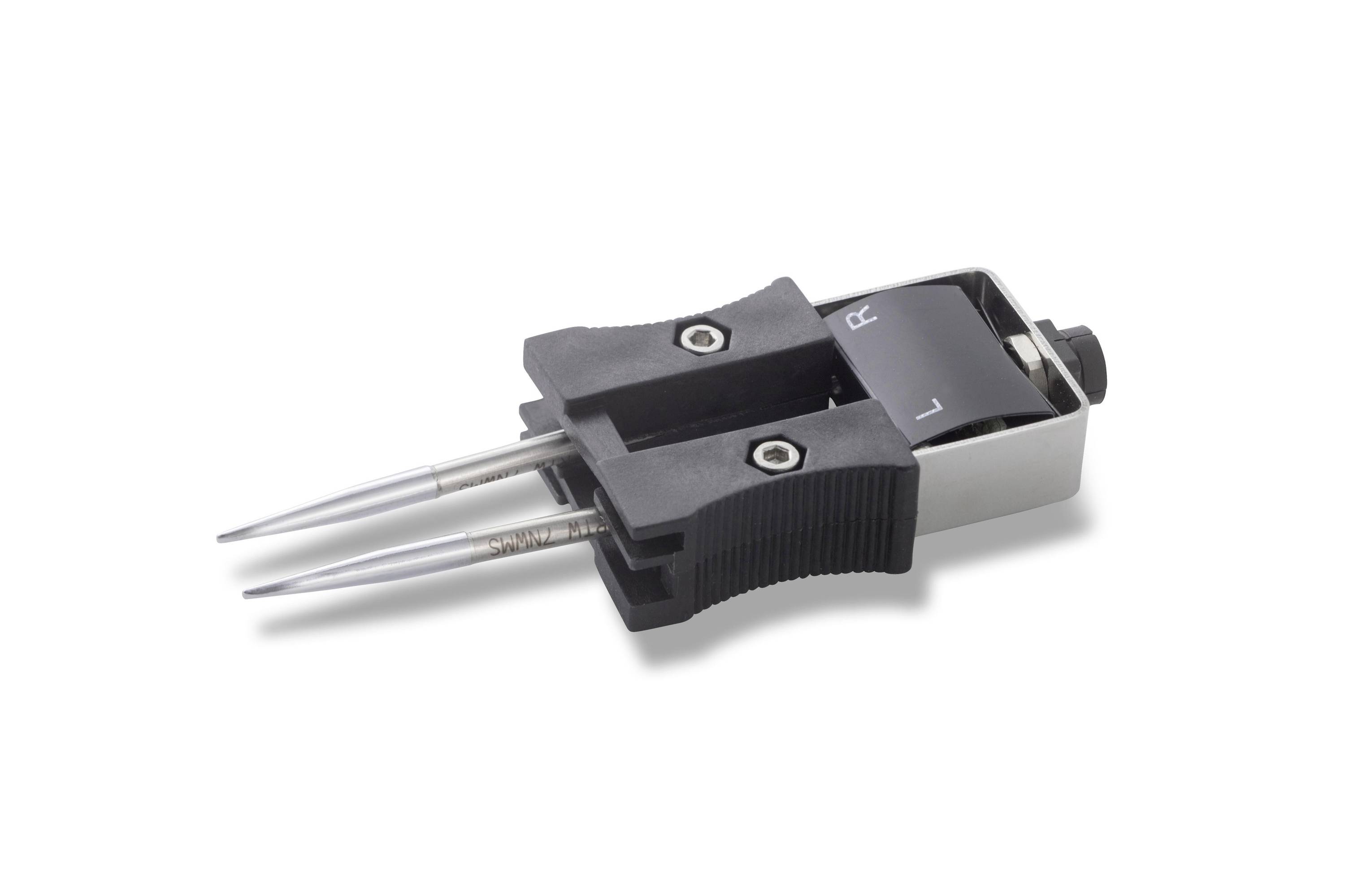 Close-up of a two-prong electrical plug connector with metal pins and black insulated housing on a white background.