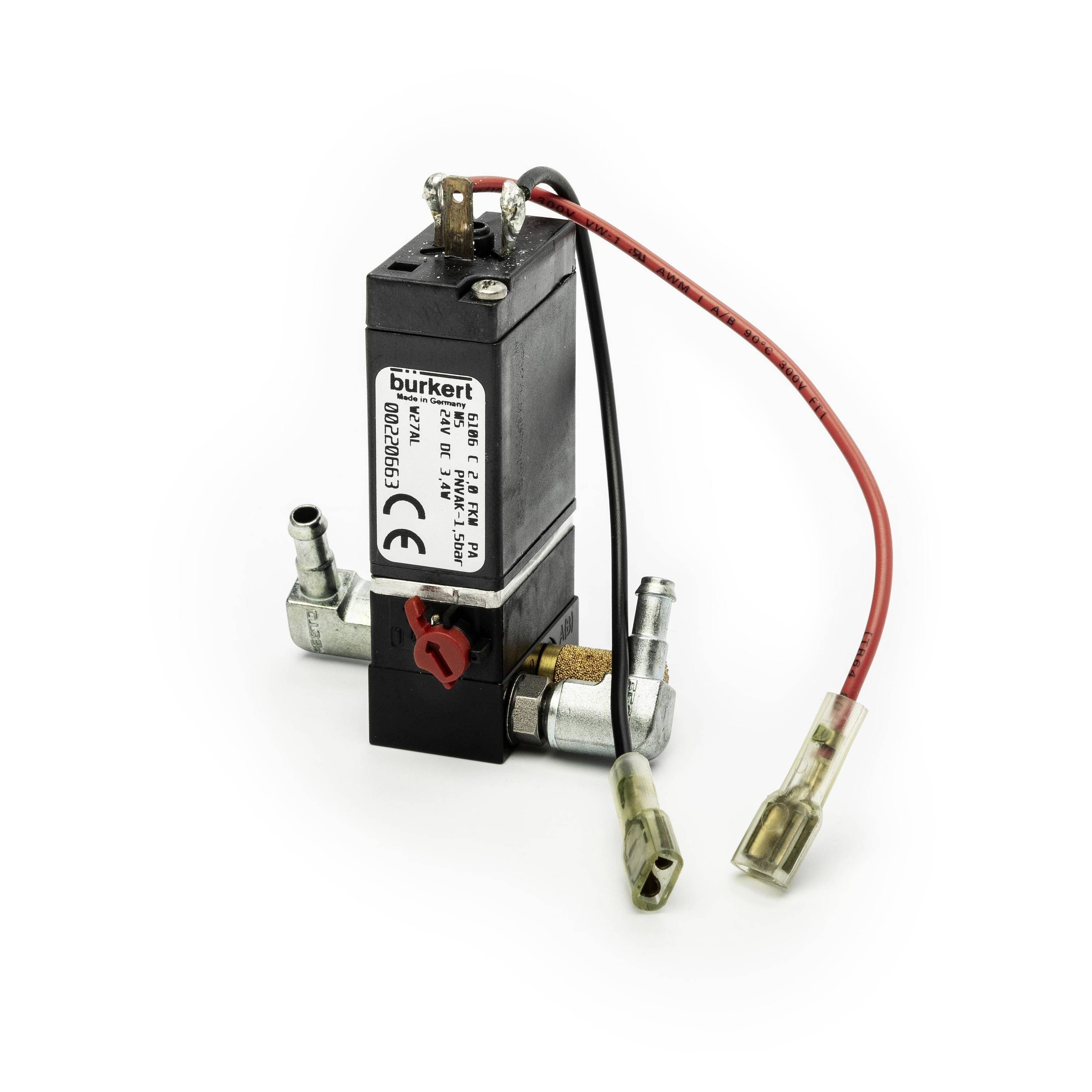 Black Bürkert solenoid valve with attached red and black wires and metal hose fittings on a white background.