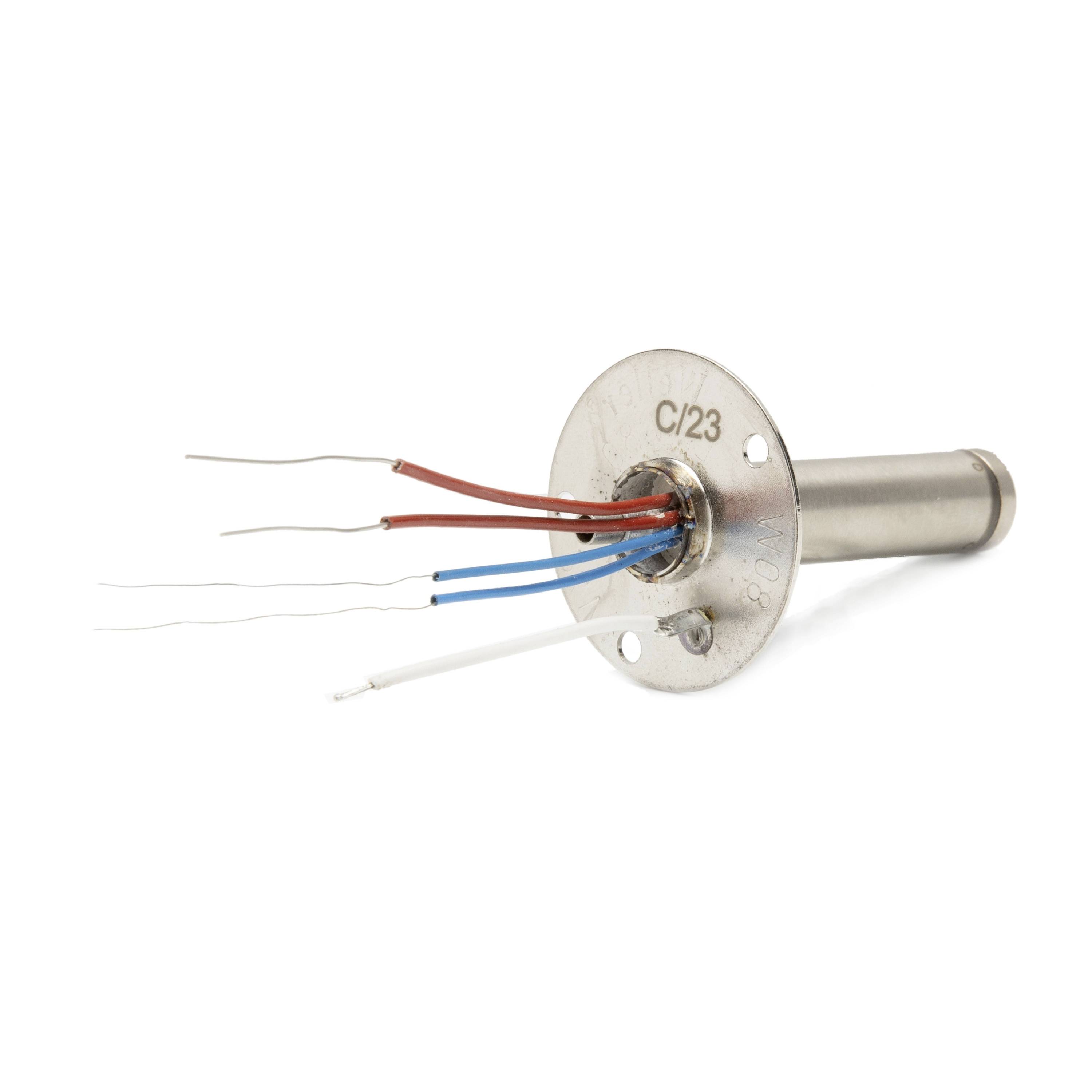 Close-up of a metal electronic component with four colored wires extending from a round mounting flange