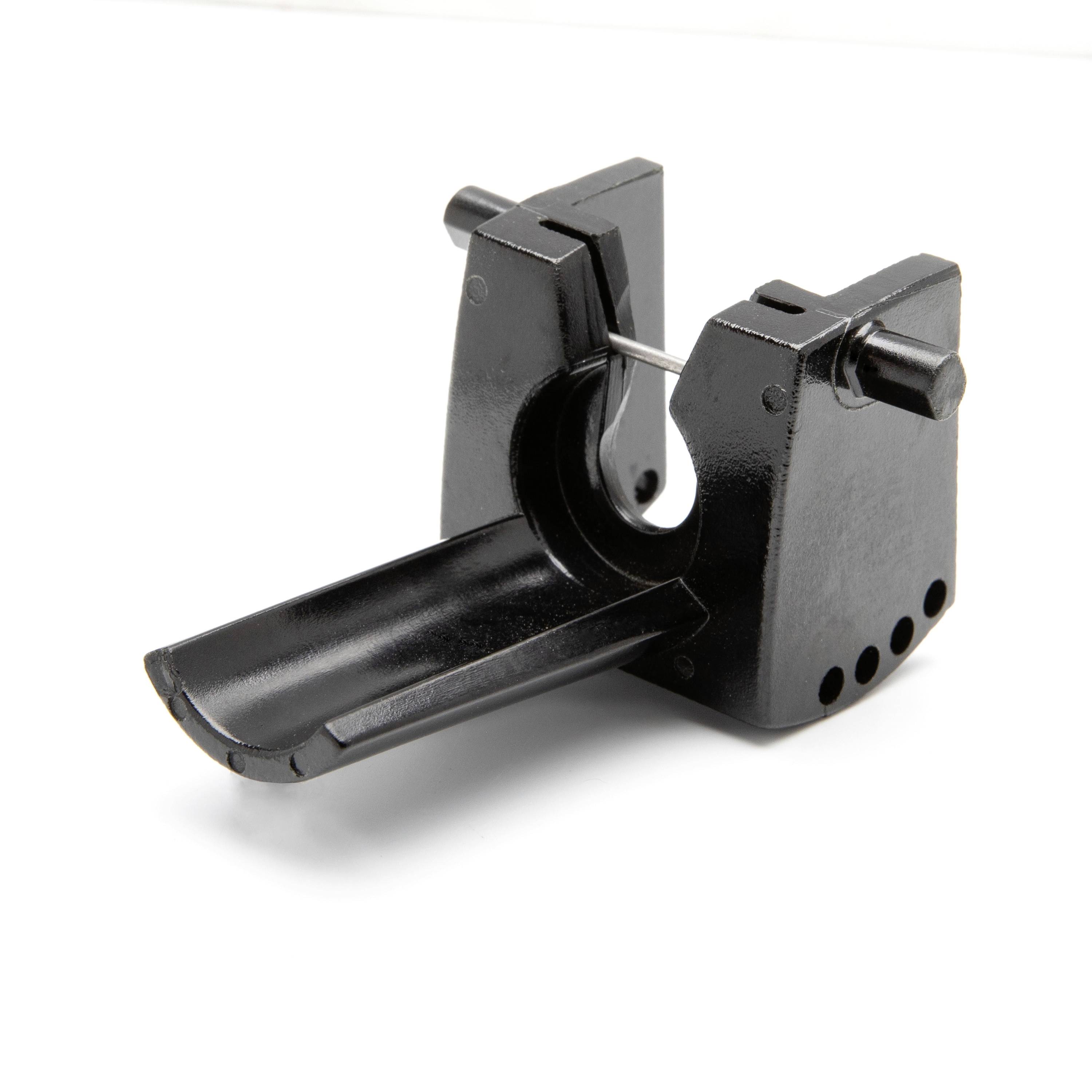 Black plastic clamp with a hinged jaw and protruding lever, shown isolated on a white background.