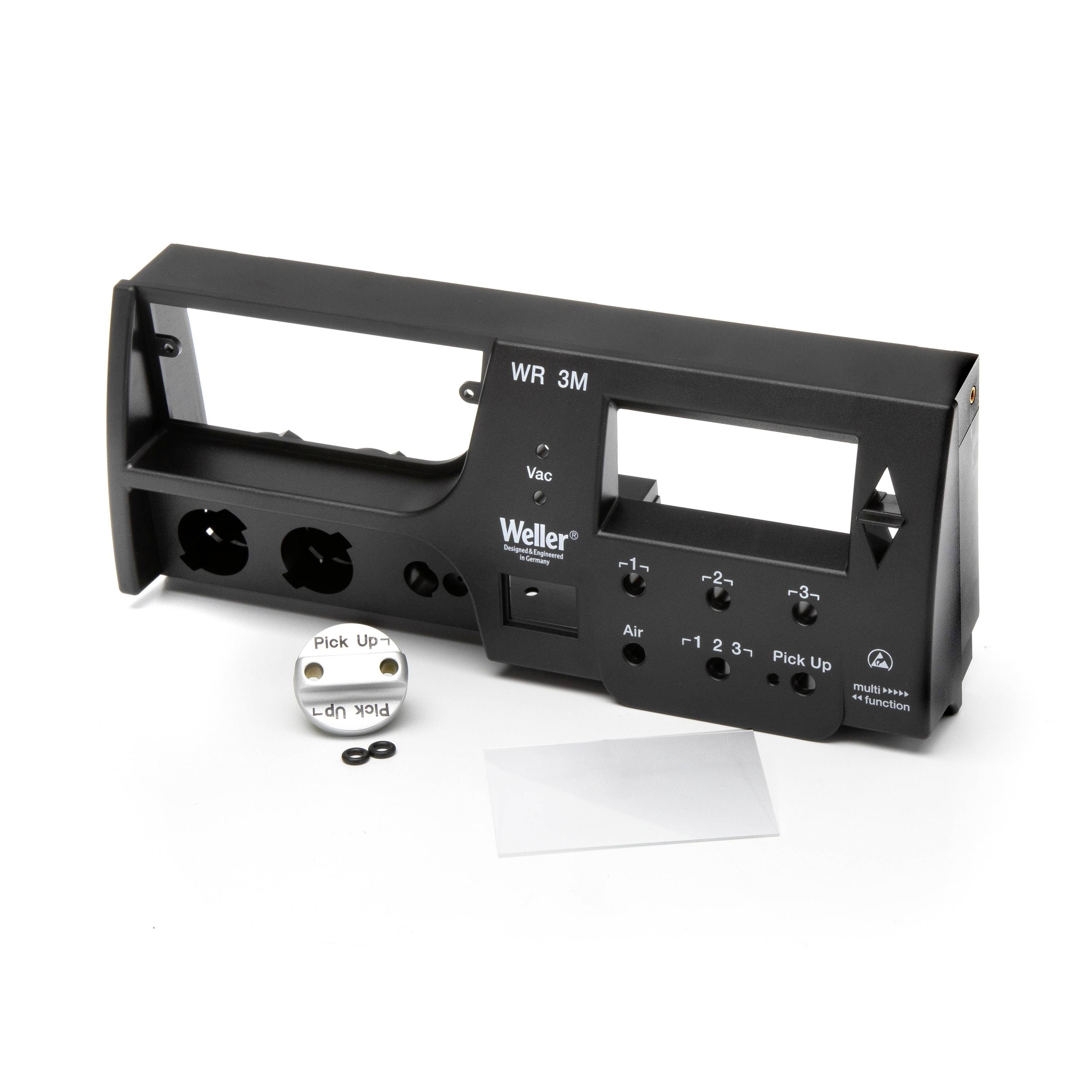 Black Weller WR 3M front panel for a soldering station, shown with a small round 'Pick Up' component and clear plastic lens pieces.