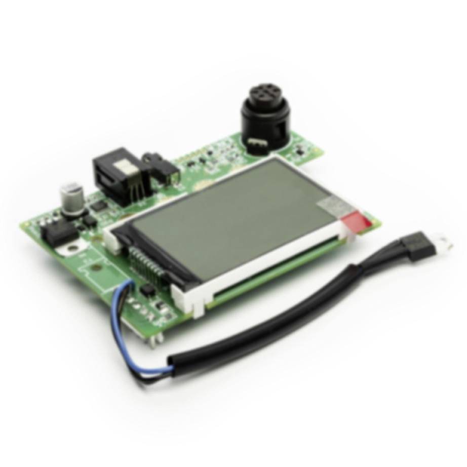Electronic circuit board with a small LCD screen, buzzer, and attached cable on a white background.