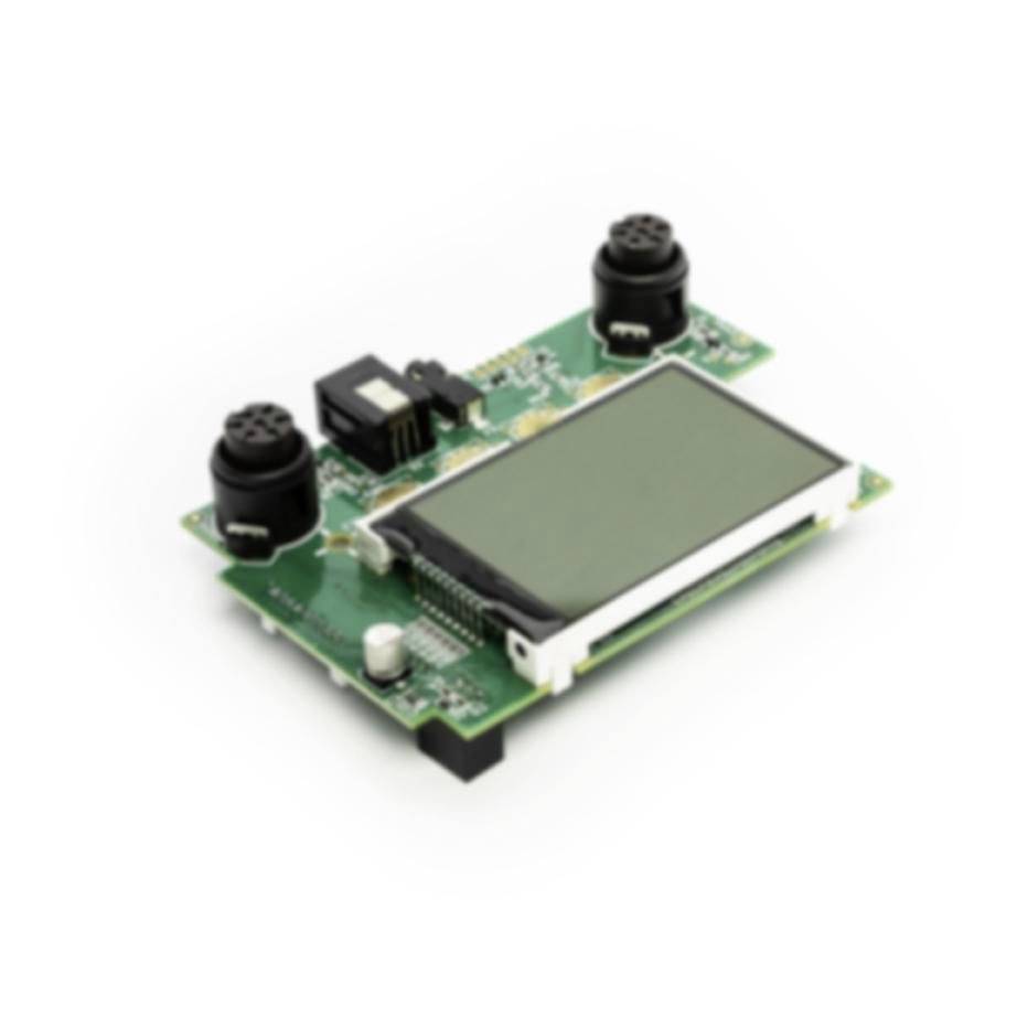 Electronic circuit board with a small LCD screen and two black sensors, shown on a white background.