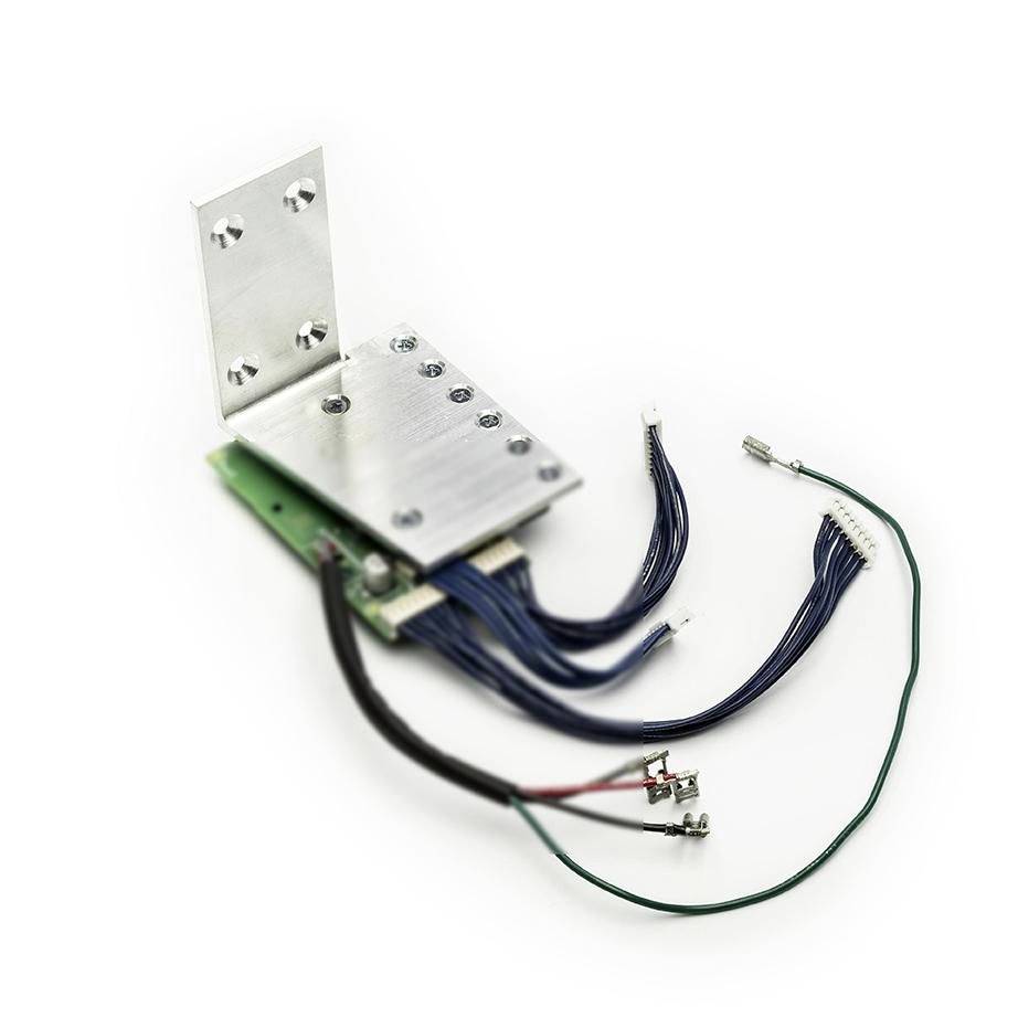 Metal electronic module with mounting bracket and attached wires and connectors on a white background.