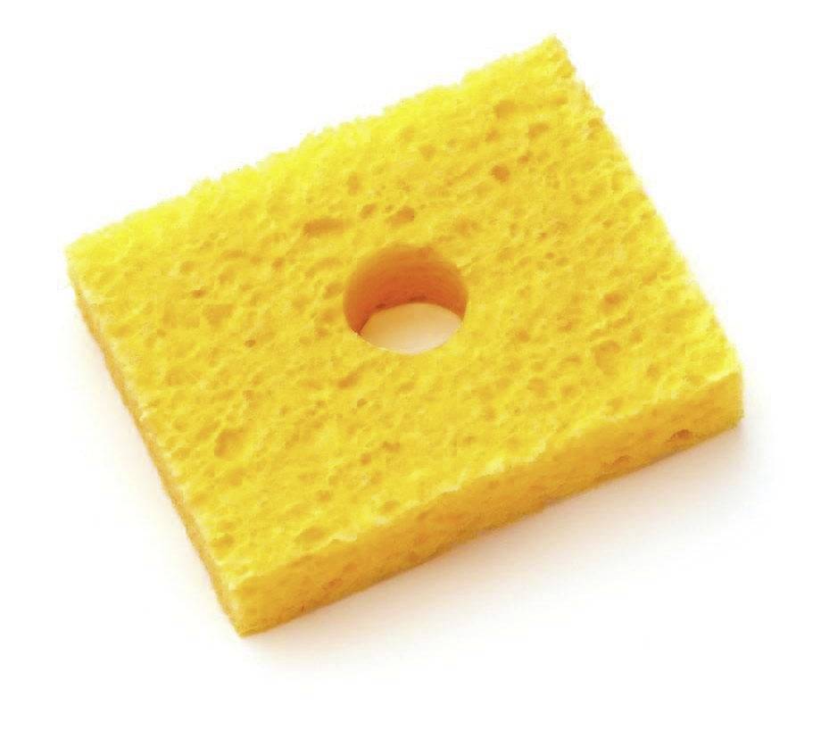 Yellow rectangular sponge with a central hole on a white background.