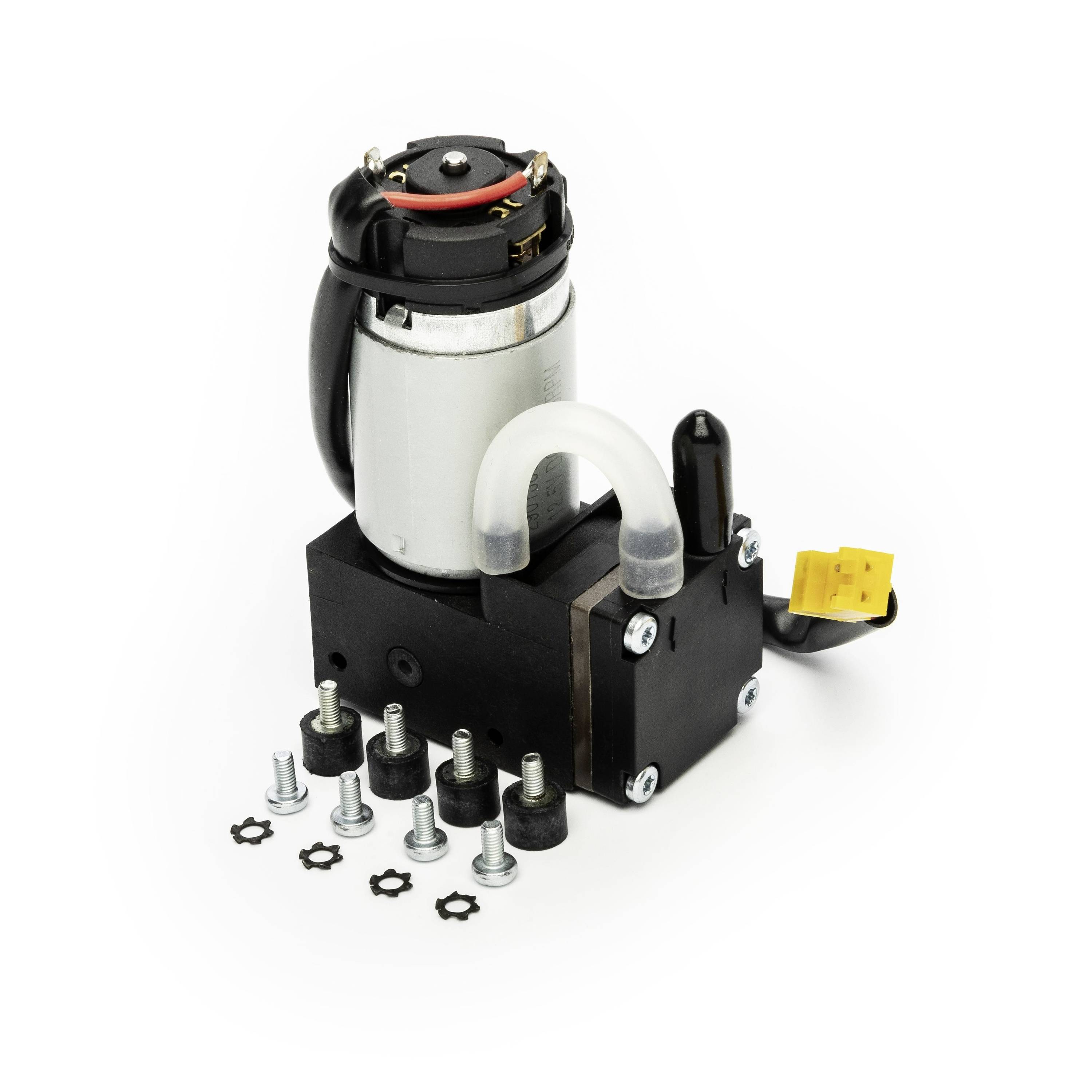 Automotive air suspension compressor pump with mounting bolts and yellow electrical connector on a white background.