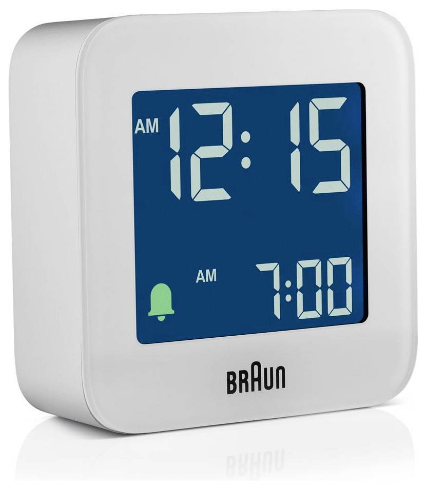Réveil numérique Braun affichant 12h15 du matin avec une alarme réglée pour 7h00 du matin.